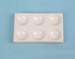 Plaque à coloration